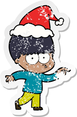 Sinirli el, bir insan tarafından çizilmiş Noel Baba şapkası takan bir çocuğun çizilmiş çıkartması.