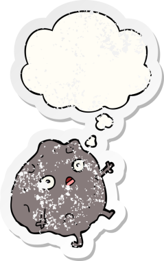 Düşünce baloncuğuyla düşen karikatür taşı insan tarafından çizilmiş yıpranmış bir çıkartma gibidir.