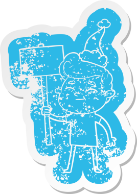 Mutlu çizgi film, insan tarafından çizilmiş Noel Baba şapkası takan bir adamın sıkıntılı çıkartması.