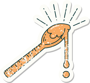 Bir insan tarafından çizilmiş bir kaşık dolusu bala ait eski bir dövme çıkartması.