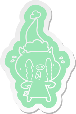 Ağlayan domuz çizgi film etiketi Noel Baba şapkası giyen bir insan tarafından çizilmiş.