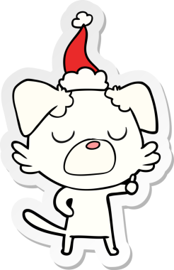 Bir insan tarafından çizilmiş Noel Baba şapkası takan bir köpeğin el yazısı.