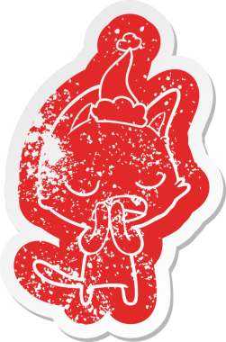 Konuşan kedi çizgi filmi. Bir insan tarafından çizilmiş Noel Baba şapkası.