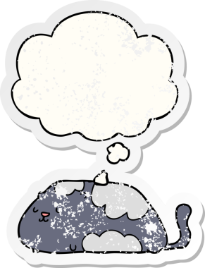 Düşünce baloncuğu olan çizgi film kedisi insan tarafından çizilmiş yıpranmış bir çıkartma.