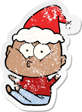 Bir insan tarafından çizilmiş Noel Baba şapkası giymiş kel bir adamın çizilmiş el yazısı.