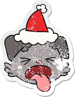 Bir insan tarafından çizilmiş Noel Baba şapkası giymiş köpek suratlı bir el yazısı.