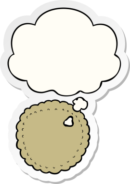 Düşünce baloncuklu çizgi film bisküvisi insan tarafından çizilmiş bir çıkartma.