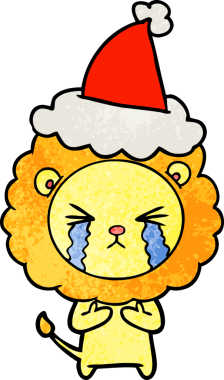 Ağlayan aslanın el çizimi bir insan tarafından çizilmiş Noel Baba şapkası.