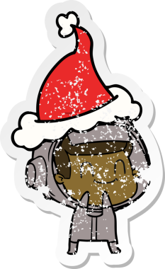 Mutlu el, bir astronotun Noel Baba şapkası giymiş bir insan tarafından çizilmiş üzgün çıkartması.