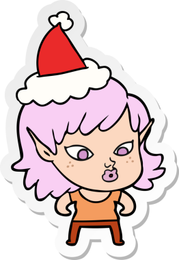 Bir insan tarafından çizilmiş Noel Baba şapkası giyen elf bir kızın güzel el yazısı.