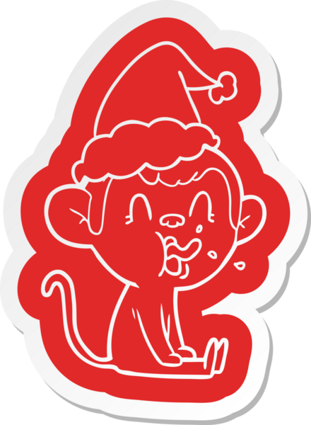 Bir insan tarafından çizilmiş Noel Baba şapkası giymiş bir maymunun çılgın çizgi film çıkartması.