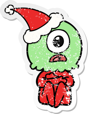 Bir insan tarafından çizilmiş Noel Baba şapkası giyen uzaylı bir Tepegöz 'ün kederli çıkartması.