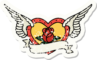 Geleneksel bir stil olan, çiçek ve pankart çizilmiş uçan kalp dövmesi.