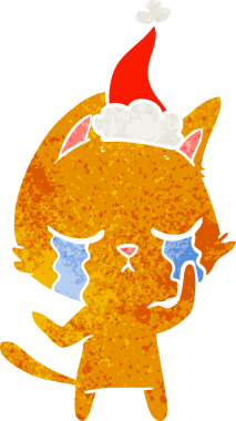 Ağlayan el, bir insan tarafından çizilmiş Noel Baba şapkası takan bir kedinin eski çizgi filmini çizdi.