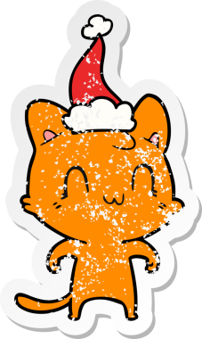 Bir insan tarafından çizilmiş Noel Baba şapkası takan mutlu bir kedinin çizilmiş el yazısı.