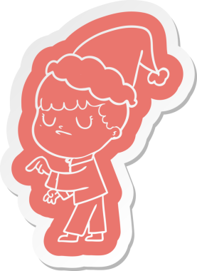 Bir insan tarafından çizilmiş Noel Baba şapkası giyen huysuz bir çocuğun garip çizgi film etiketi.