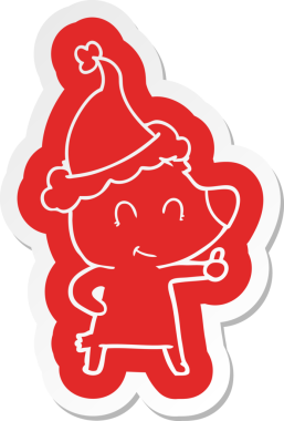 Bir insan tarafından çizilmiş Noel Baba şapkasının garip bir çizgi film çıkartması.