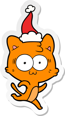 Bir insan tarafından çizilmiş Noel Baba şapkasıyla koşan sürpriz bir kedinin el yazısı.