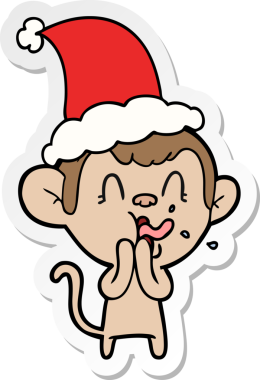 Bir insan tarafından çizilmiş Noel Baba şapkası giyen bir maymunun çılgın el çizimi karikatürü.