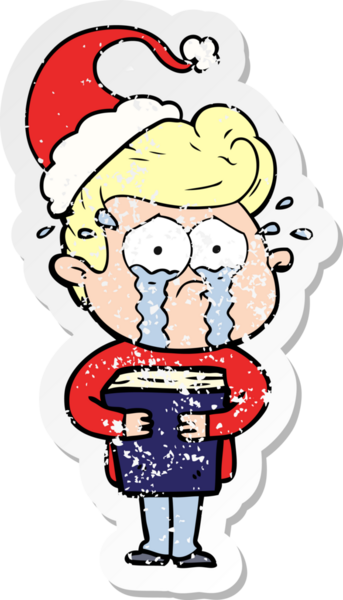 Ağlayan bir adamın, elinde Noel Baba şapkası olan ve bir insan tarafından çizilmiş bir kitap tutarken çekilmiş bir karikatür.