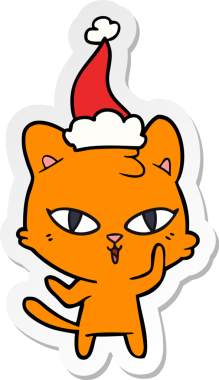 Bir insan tarafından çizilmiş Noel Baba şapkası takan bir kedinin el yazısı.