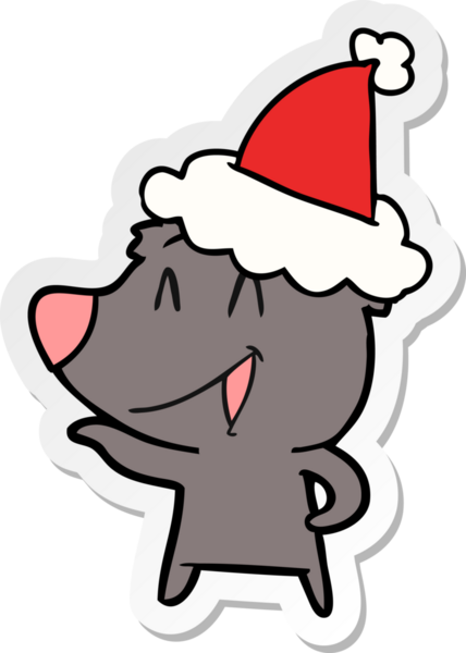 Gülen ayı eli bir insan tarafından çizilmiş Noel Baba şapkasının çıkartması.