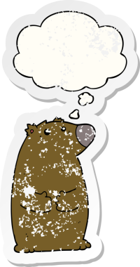 Düşünce baloncuğu olan çizgi film ayısı bir insan tarafından çizilmiş yıpranmış bir çıkartma.