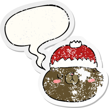 Bir insan tarafından çizilmiş sıkıntılı eski bir çıkartma, konuşma balonuyla karikatür Noel ayısı.