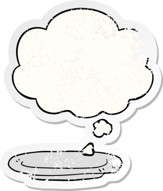 Düşünce baloncuklu çizgi film levhası, insan tarafından çizilmiş yıpranmış bir çıkartma gibi.