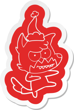 Bir insan tarafından çizilmiş Noel Baba şapkası giymiş sırıtan tilki çıkartması.