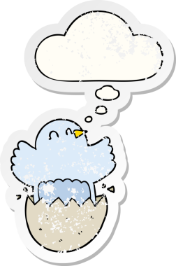 Düşünce baloncuğu ile yumurtadan çıkan karikatür insan tarafından çizilmiş yıpranmış bir çıkartma gibi.