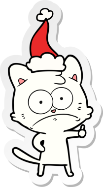 Bir insan tarafından çizilmiş Noel Baba şapkası takan gergin bir kedinin el yazısı.