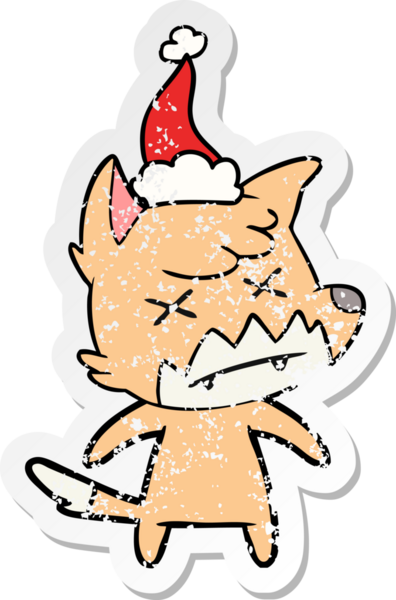 Bir insan tarafından çizilmiş Noel Baba şapkası giymiş ölü bir tilkinin kederli çıkartması.