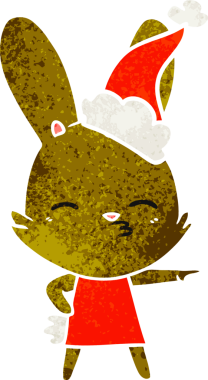 Meraklı tavşan eli bir insan tarafından çizilmiş eski bir Noel Baba şapkası çizimi.