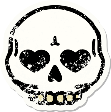 Bir insan tarafından çizilmiş geleneksel bir kafatası stili dövmesi var.