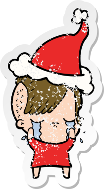 Bir insan tarafından çizilmiş Noel Baba şapkası giymiş ağlayan bir kızın el yazısı.