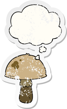 Düşünce baloncuğu olan karikatür mantarı insan tarafından çizilmiş yıpranmış bir çıkartma.