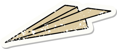 Bir insan tarafından çizilmiş kağıttan bir uçağın geleneksel stil dövmesi.