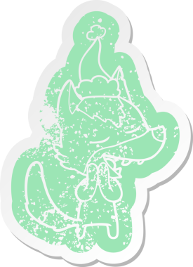 Garip bir karikatür. Bir insan tarafından çizilmiş Noel Baba şapkasıyla gülen bir kurt çıkartması.