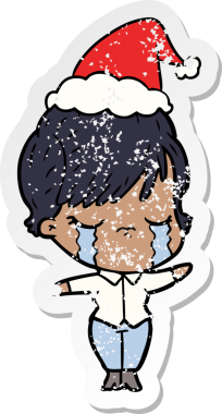 Bir insanın çizdiği Noel Baba şapkasıyla ağlayan bir kadının el yazısı.