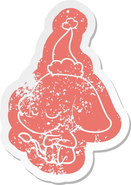 Bir insan tarafından çizilmiş Noel Baba şapkası takan gülümseyen bir filin garip bir karikatürü.