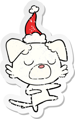 Bir insan tarafından çizilmiş Noel Baba şapkası takan bir köpeğin el yazısı.