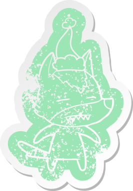 Garip çizgi film, bir insanın çizdiği Noel Baba şapkasını takan dişlerini gösteren bir kurt çıkartması.