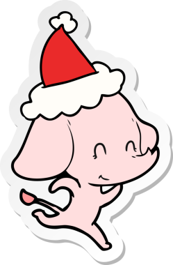 Bir insan tarafından çizilmiş Noel Baba şapkası takan bir fil çizimi.