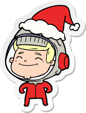 Bir insan tarafından çizilmiş Noel Baba şapkası giyen bir astronotun mutlu el çizimi karikatürü.
