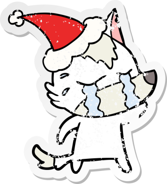 Bir insan tarafından çizilmiş Noel Baba şapkası giymiş ağlayan bir kurt resmi.