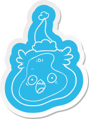 Bir insan tarafından çizilmiş Noel Baba şapkası takan bir mikrop çıkartması.