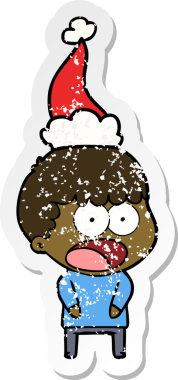 Şok olmuş bir adamın insan tarafından çizilmiş Noel Baba şapkası giymiş bir el yazısı.