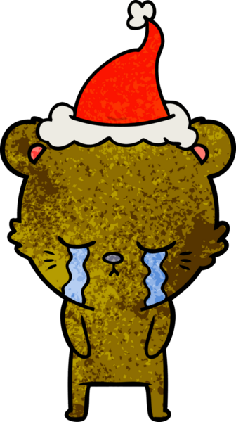 Ağlayan el çizimi bir insan tarafından çizilmiş Noel Baba şapkası takan bir ayı.