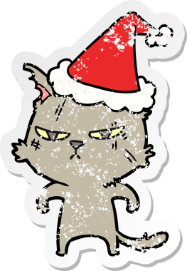 Sert el çizilmiş kedinin insan tarafından çizilmiş Noel Baba şapkası giymiş bir çıkartması.